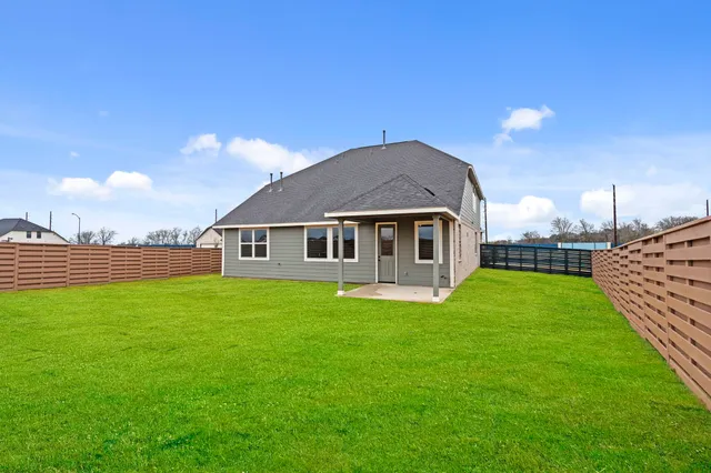 a kitchen with a table and chairs in it