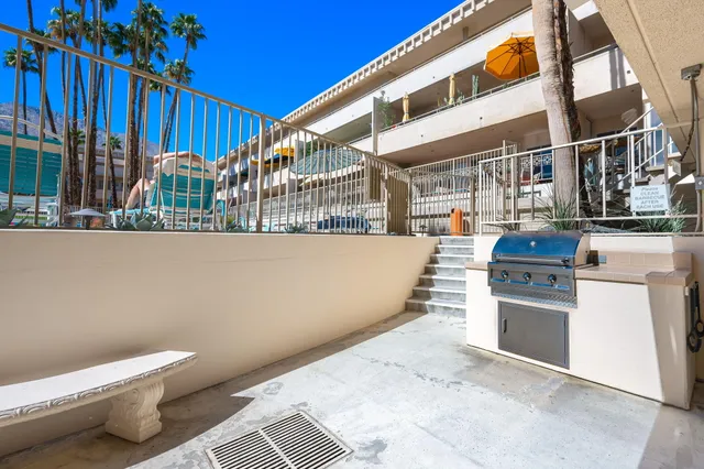 a view of a kitchen with a stove and a window