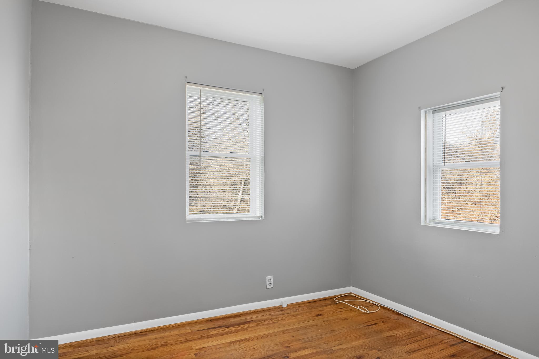 227 Whittier Avenue Moorestown, NJ 08057 - Photo 12 of 19 a view of a room with wooden floor and a window