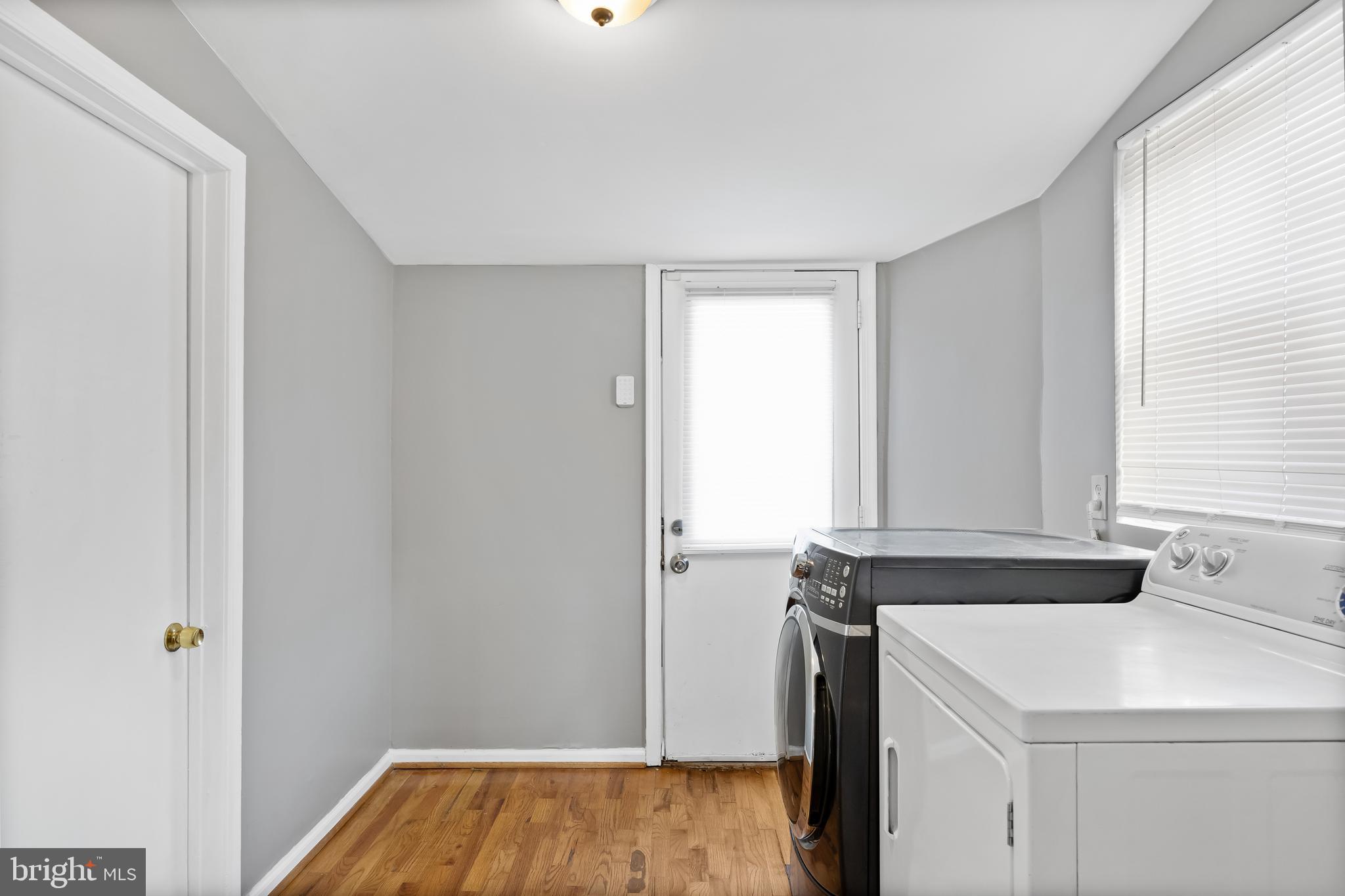 227 Whittier Avenue Moorestown, NJ 08057 - Photo 13 of 19 a view of a kitchen that shows a sink dishwasher and wooden floor