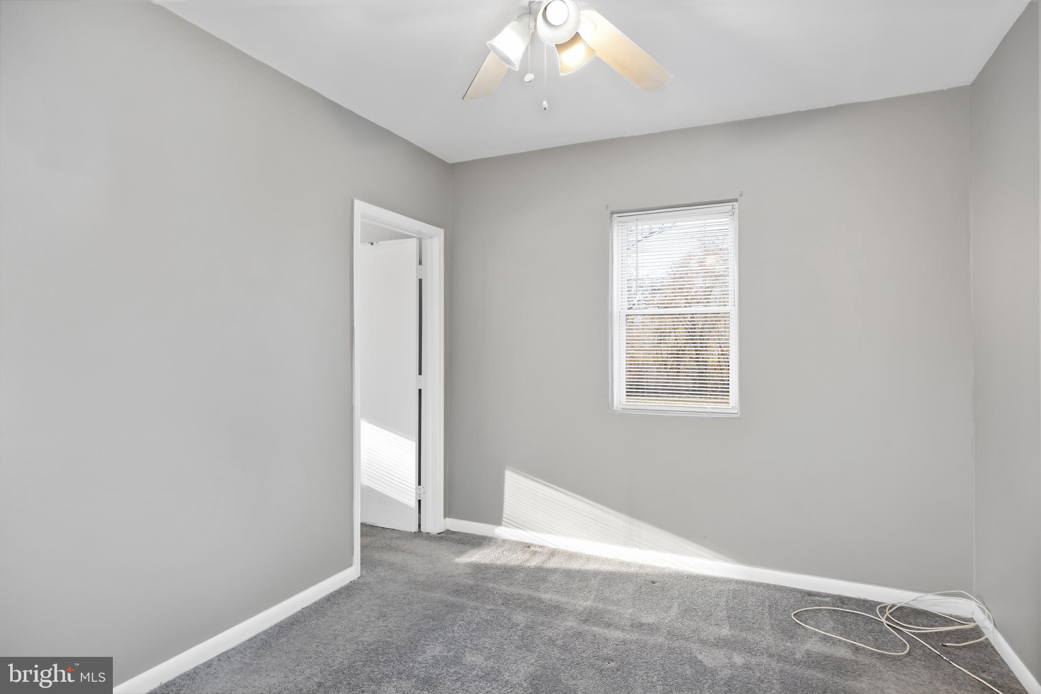 227 Whittier Avenue Moorestown, NJ 08057 - Photo 7 of 19 an empty room with windows and closet