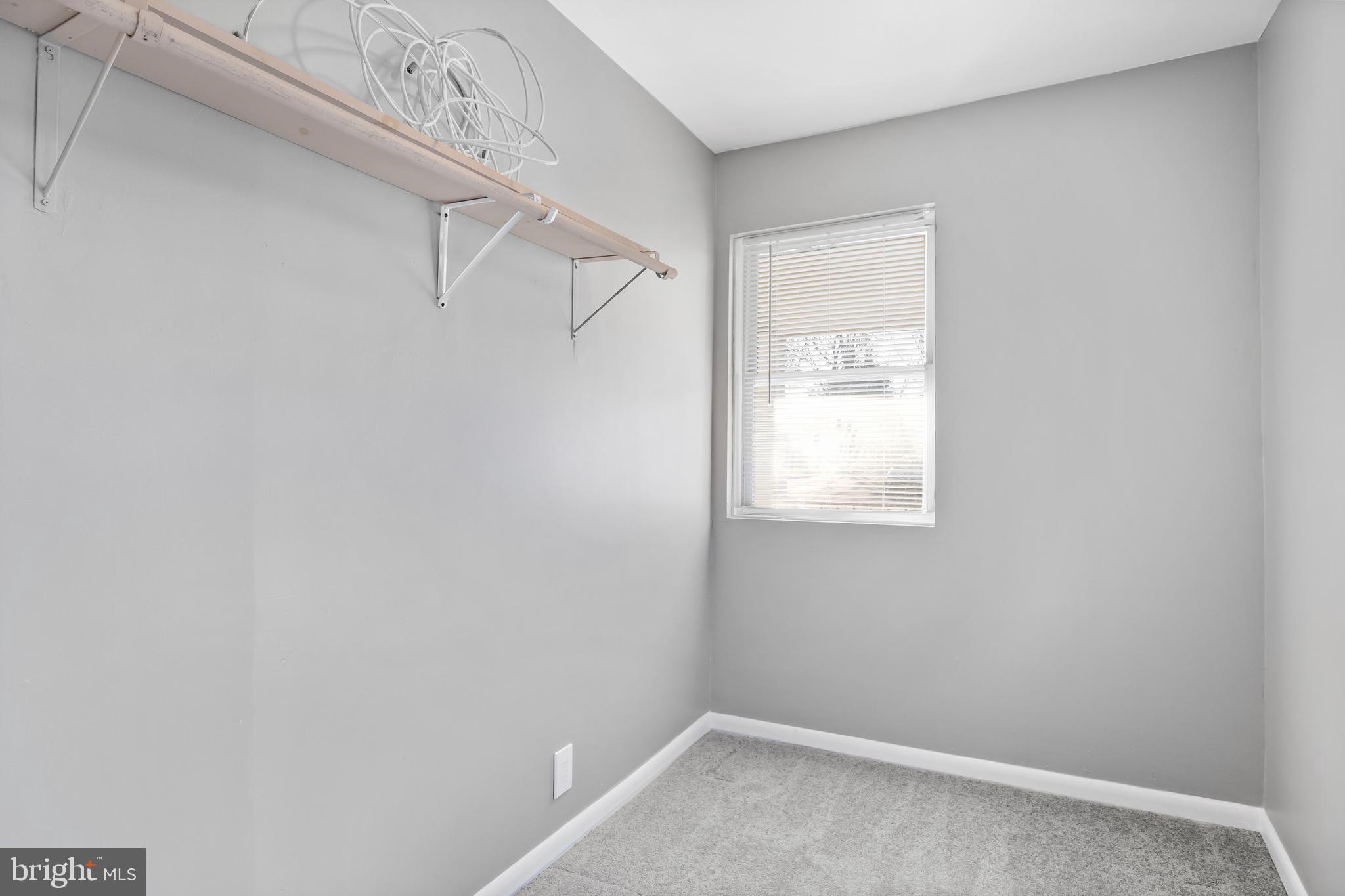 227 Whittier Avenue Moorestown, NJ 08057 - Photo 8 of 19 a small space with a window and a fan