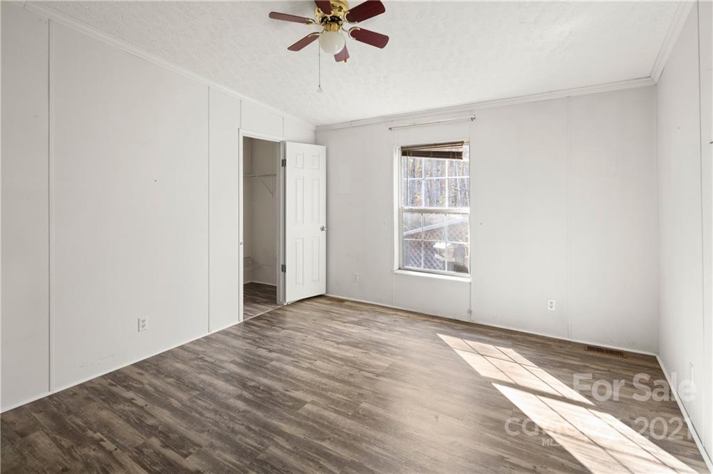2226 Poplar Cove Road Clyde, NC 28721 - Photo 15 of 21 a view of an empty room with a window