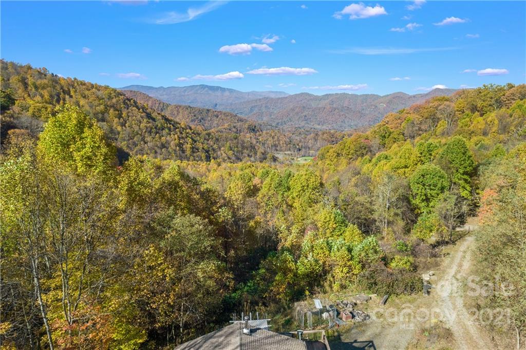 2226 Poplar Cove Road Clyde, NC 28721 - Photo 6 of 21 a view of a city with mountains in the background