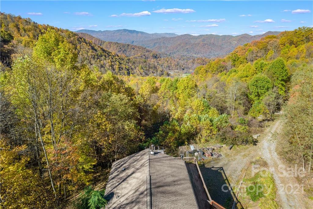 2226 Poplar Cove Road Clyde, NC 28721 - Photo 7 of 21 a view of an outdoor space and mountain