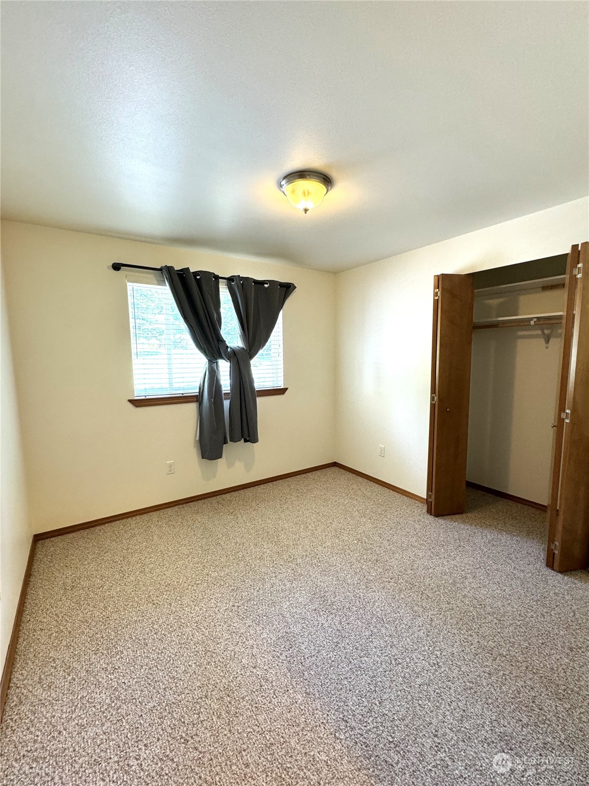 3274 East Harbor Road Langley, WA 98260 - Photo 16 of 21 an empty room with windows