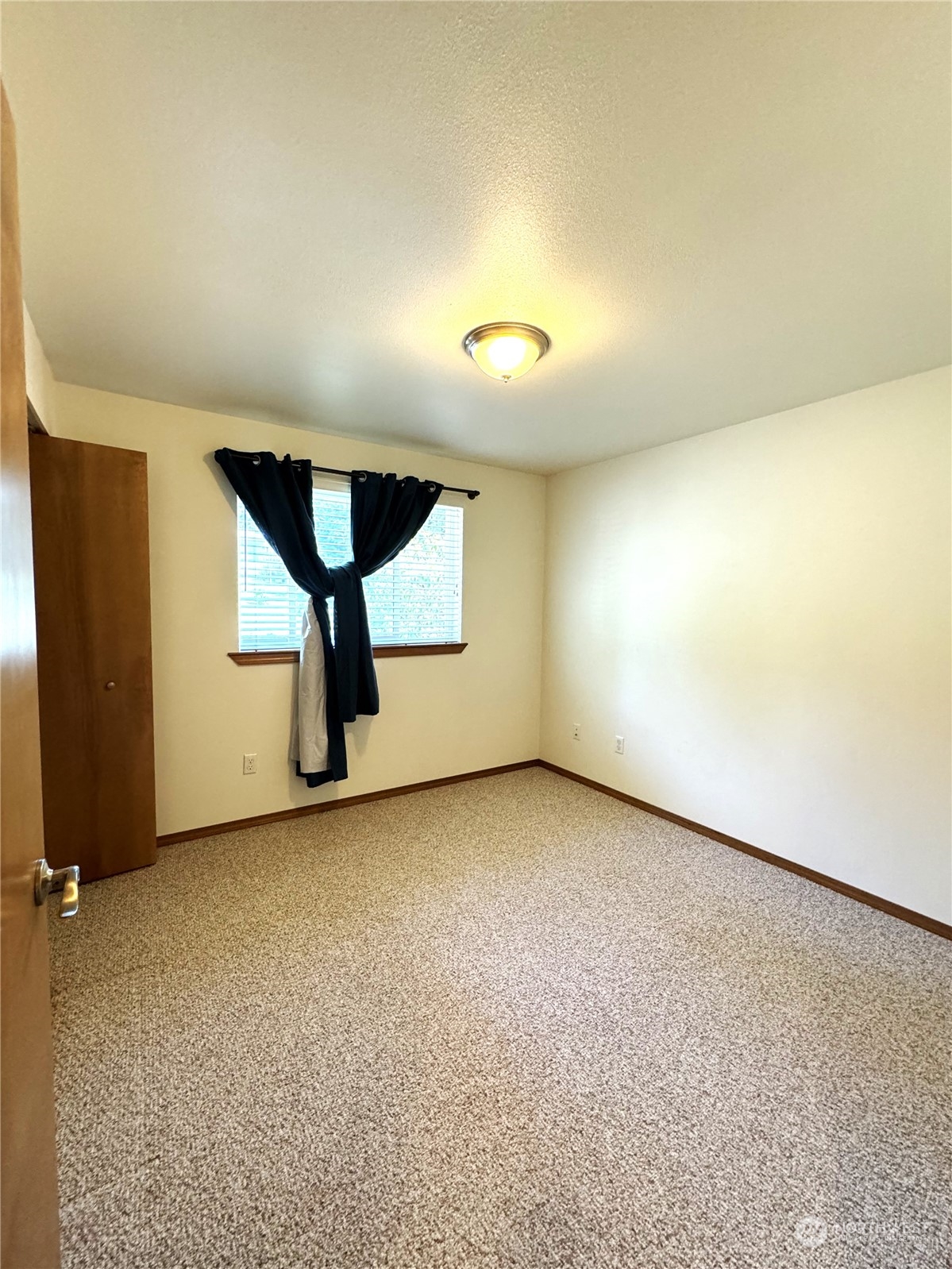 3274 East Harbor Road Langley, WA 98260 - Photo 17 of 21 an empty room with windows