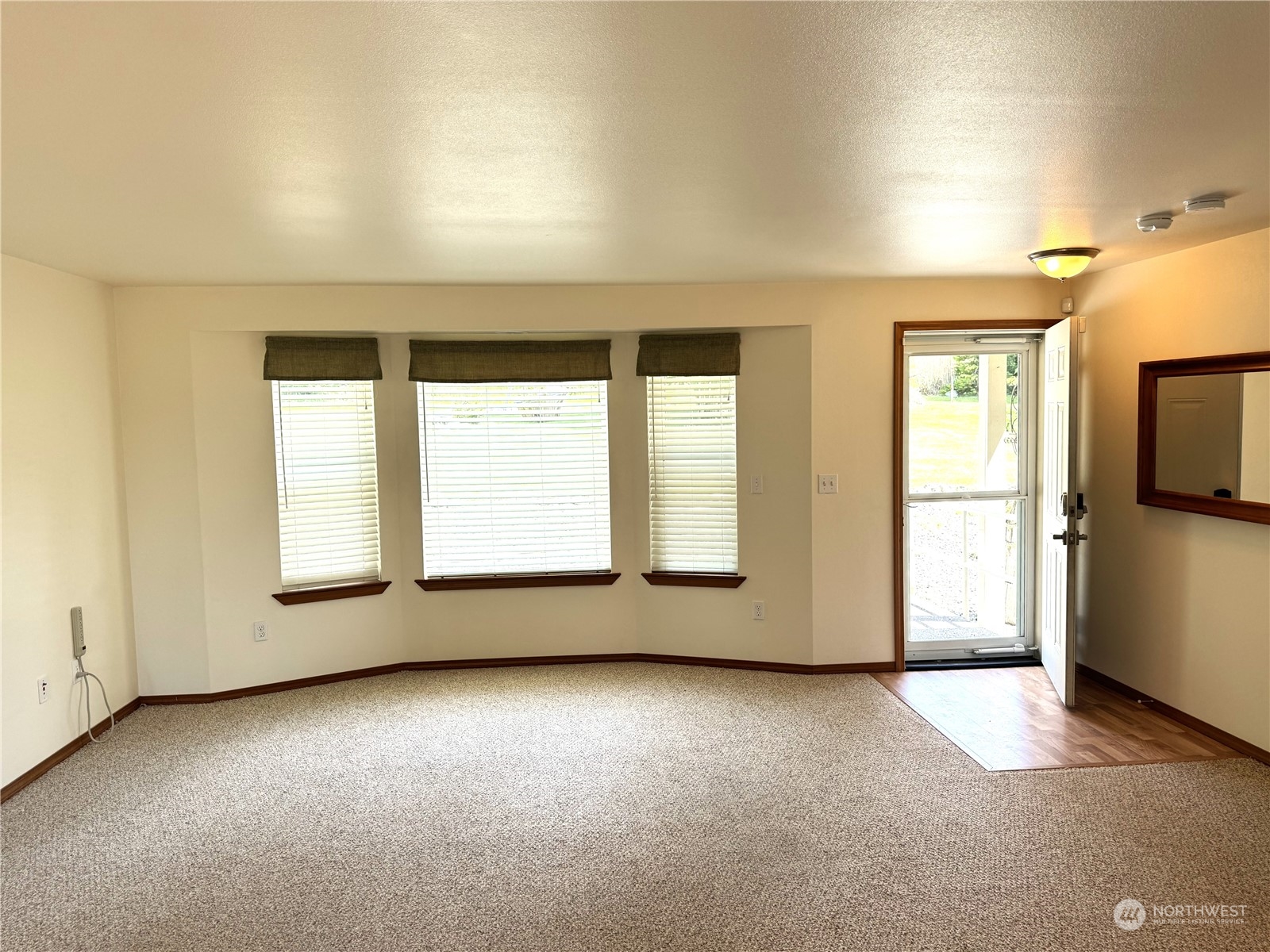 3274 East Harbor Road Langley, WA 98260 - Photo 6 of 21 an empty room with windows