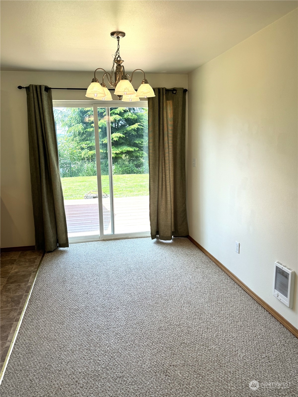 3274 East Harbor Road Langley, WA 98260 - Photo 9 of 21 a view of an empty room with a window