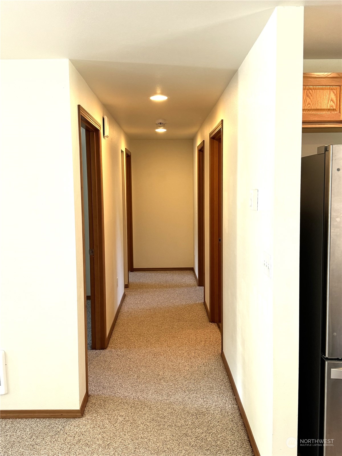 3274 East Harbor Road Langley, WA 98260 - Photo 10 of 21 a view of hallway with a large window