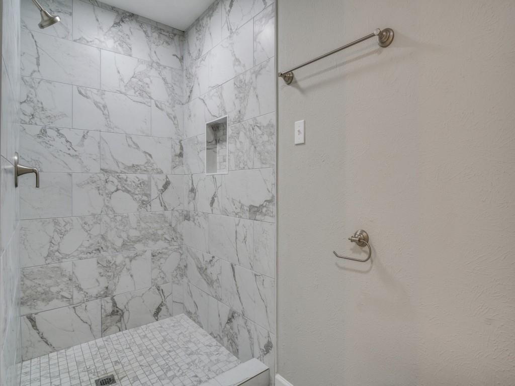 9523 Bellechase Road Granbury, TX 76049 - Photo 17 of 25 a bathroom with a shower