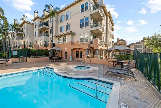 a view of a building with sitting area