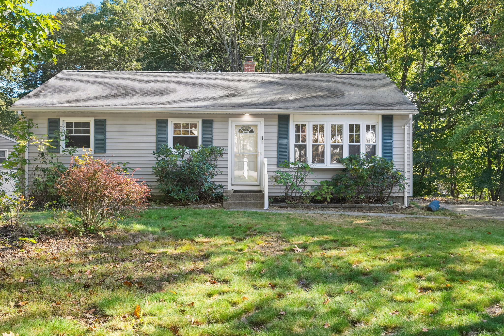 17 Manor Road Montville, CT 06370 - Photo 1 of 1 a view of a house with yard and a garden