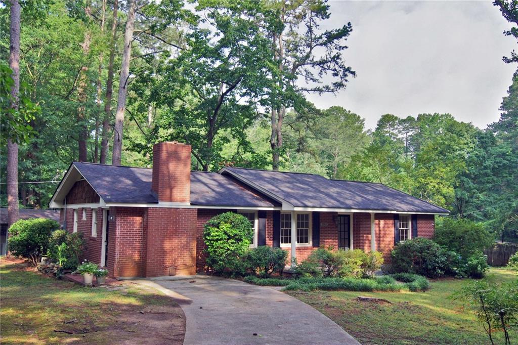 2602 Wood Trail Lane Decatur, GA 30033 - Photo 1 of 1 a view of a house with garden