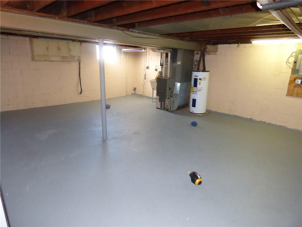 524 Scene Ridge Road Liberty, PA 15133 - Photo 13 of 23 Large open basement with great ceiling height has been newly painted and awaits your finishing touches.