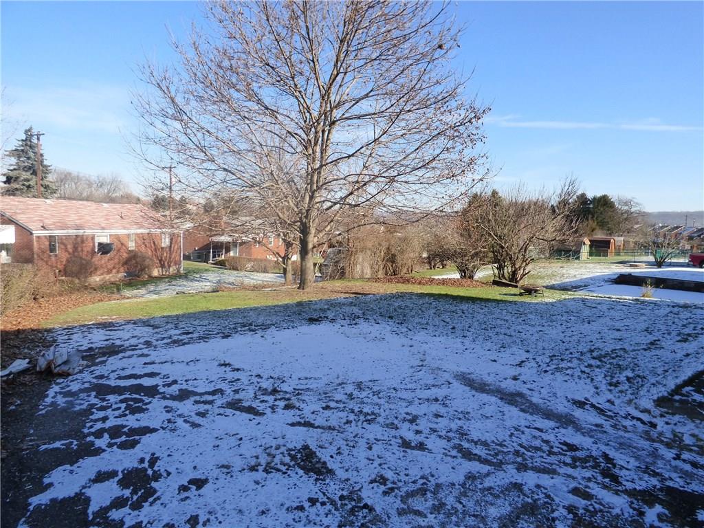 524 Scene Ridge Road Liberty, PA 15133 - Photo 22 of 23 Serene level back yard with large parking area