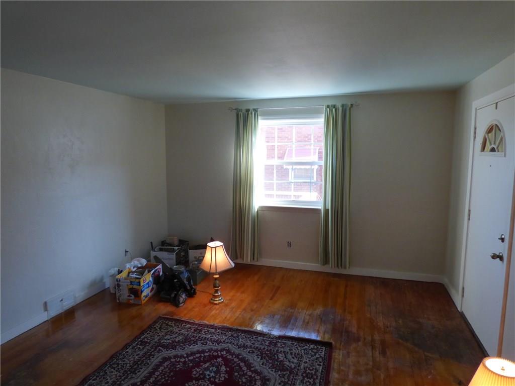 524 Scene Ridge Road Liberty, PA 15133 - Photo 7 of 23 Living room, newer neutral paint in each room.