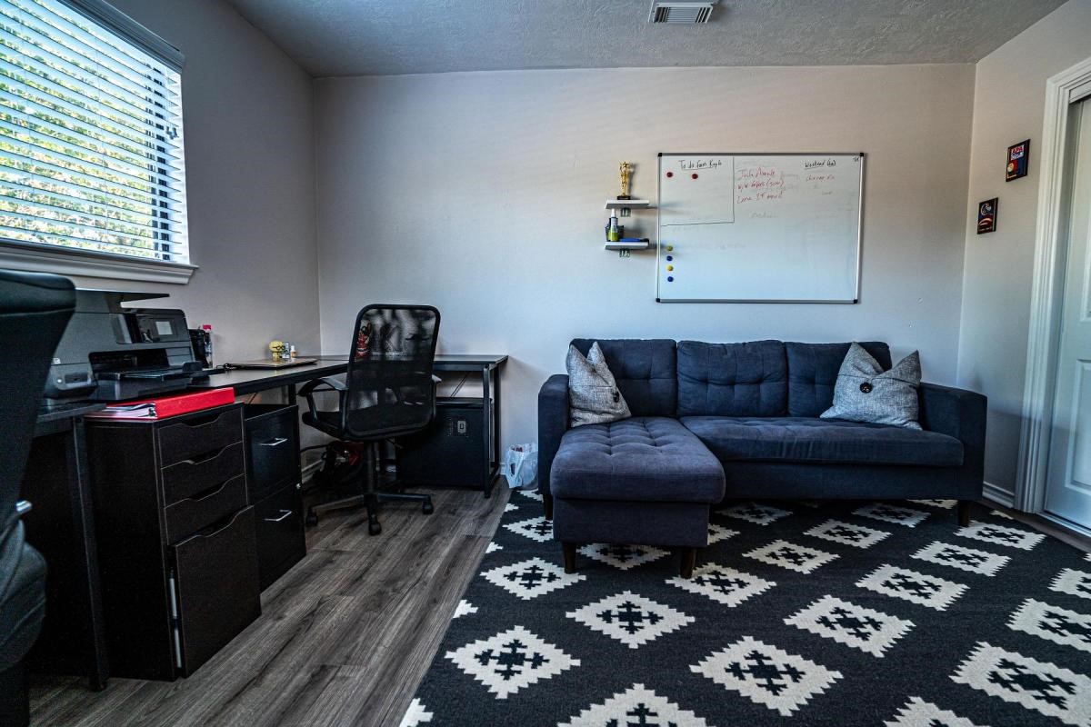 13209 Bluff View Drive Willis, TX 77318 - Photo 14 of 21 a living room with furniture and a rug