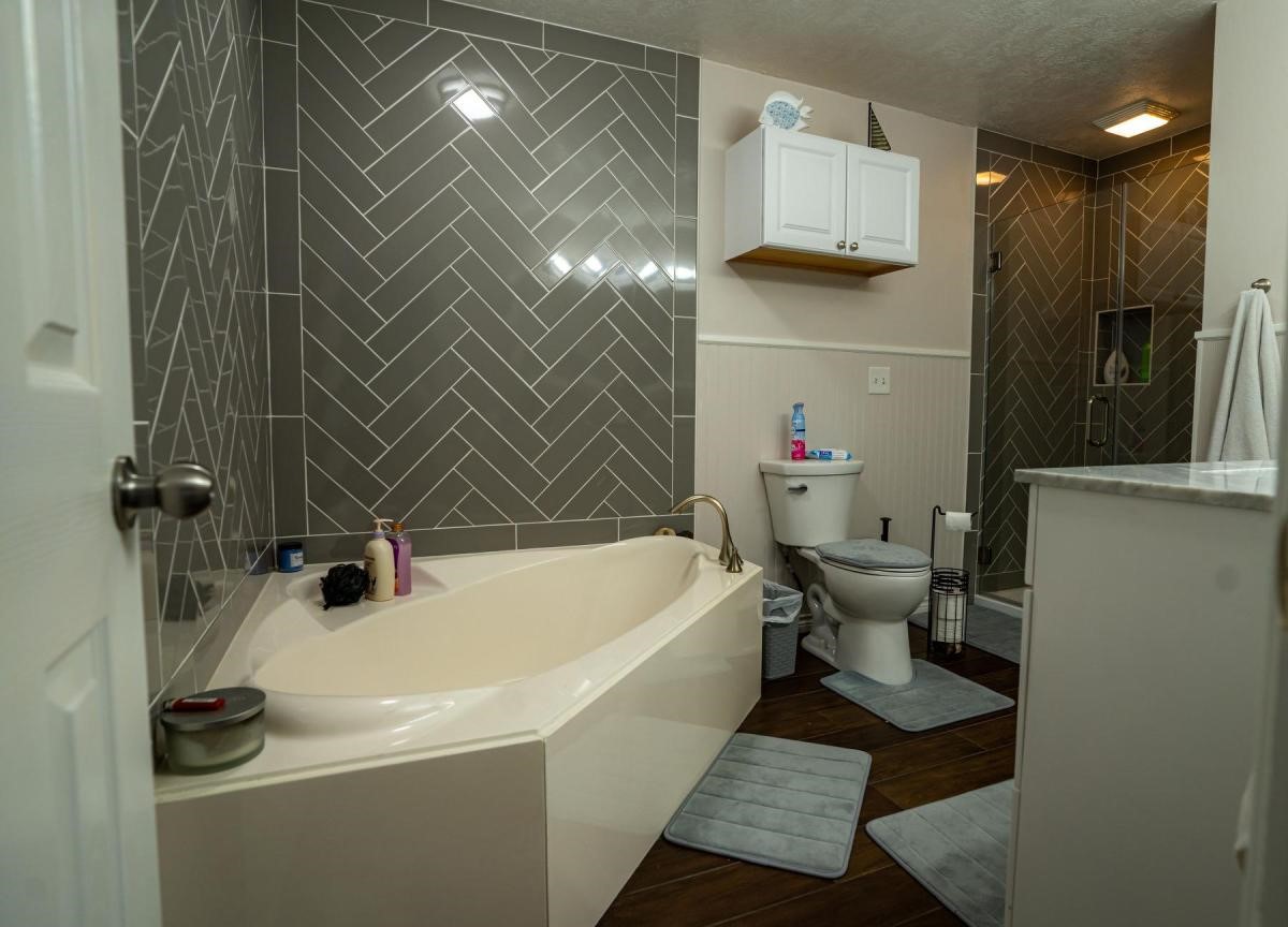 13209 Bluff View Drive Willis, TX 77318 - Photo 19 of 21 a bathroom with a sink and a shower