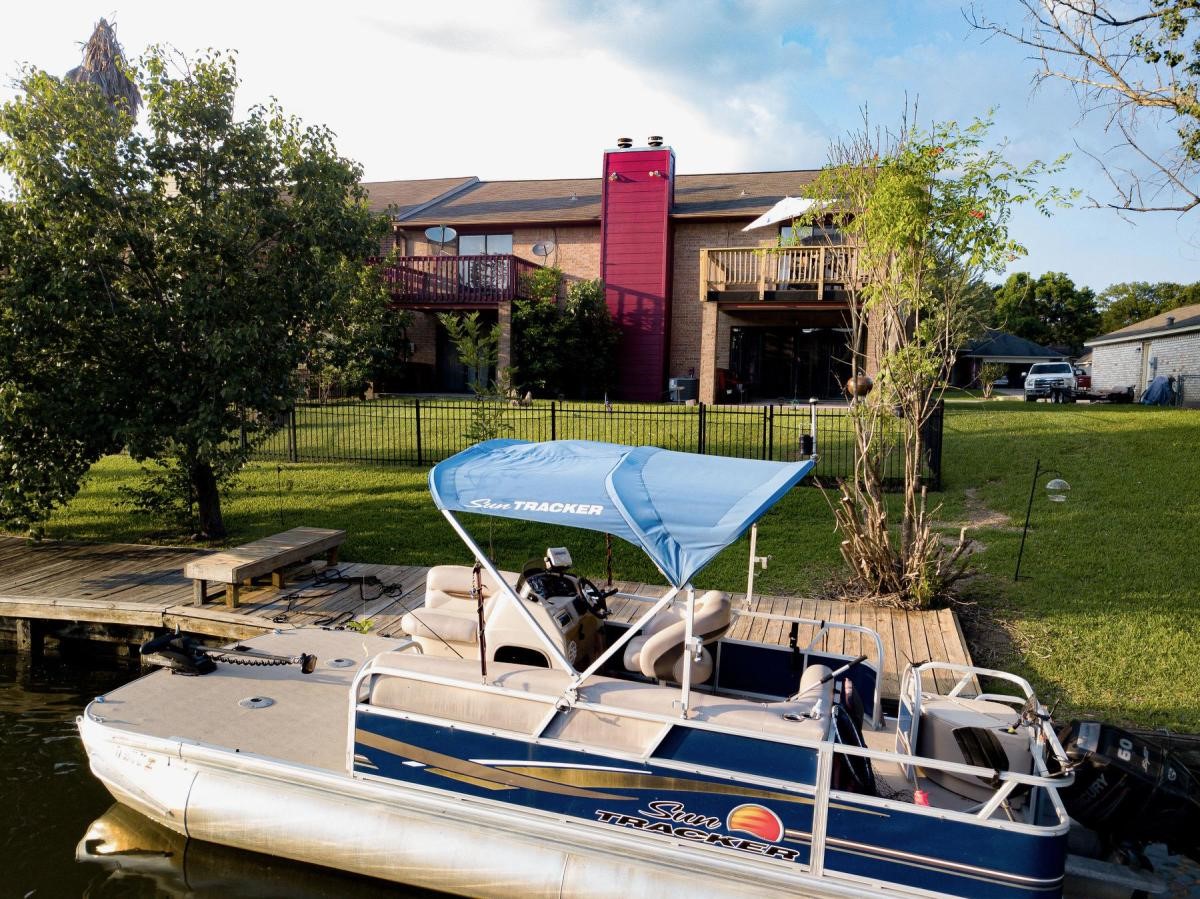 13209 Bluff View Drive Willis, TX 77318 - Photo 21 of 21 a view of a chairs and table in the patio