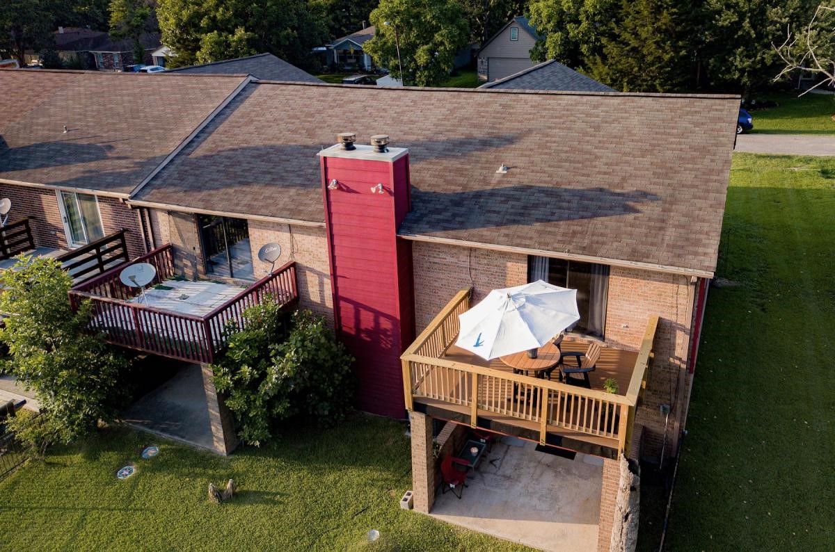 13209 Bluff View Drive Willis, TX 77318 - Photo 3 of 21 an aerial view of a house with swimming pool and garden