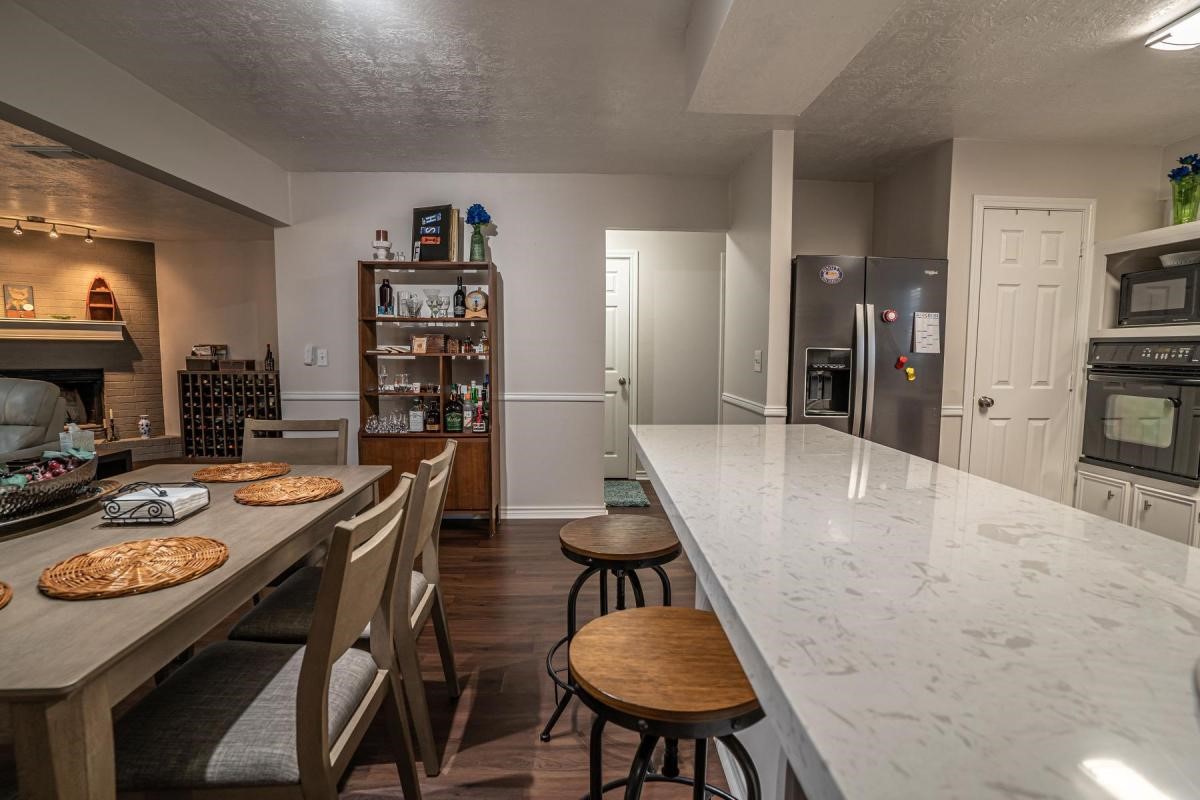 13209 Bluff View Drive Willis, TX 77318 - Photo 7 of 21 a dining room with furniture and wooden floor