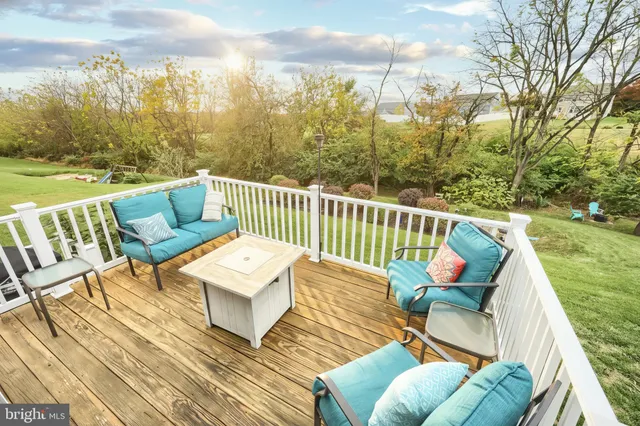 a view of room with window and wooden floor