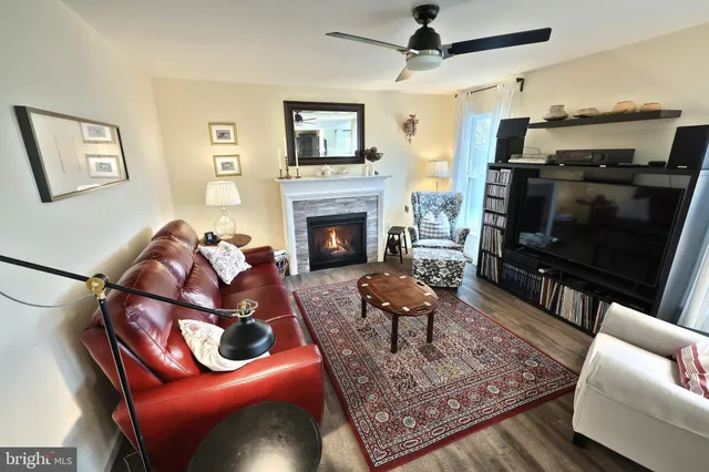 a large kitchen with a table and chairs