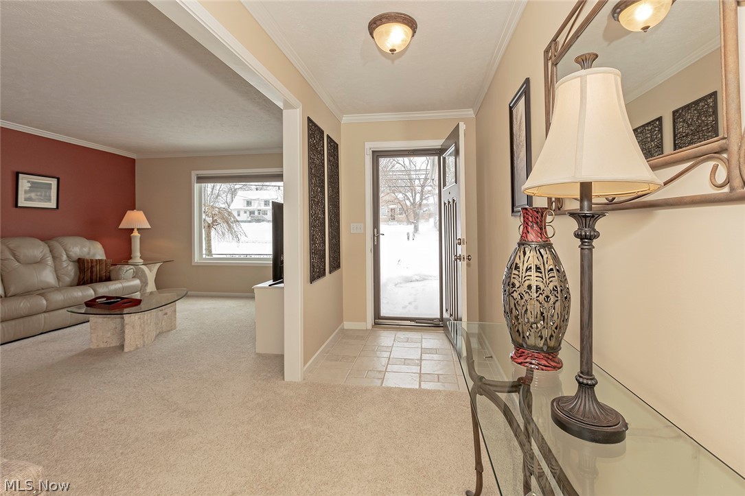 5420 Bartlett Road Bedford, OH 44146 - Photo 2 of 32 Spacious and elongated foyer creates a warm welcome for guests.