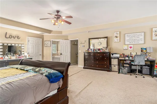 a bed room with a bed and a night stand