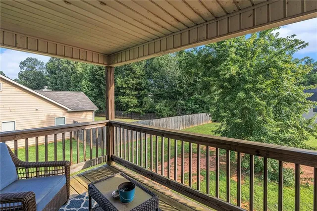 a view of a two chairs in the deck