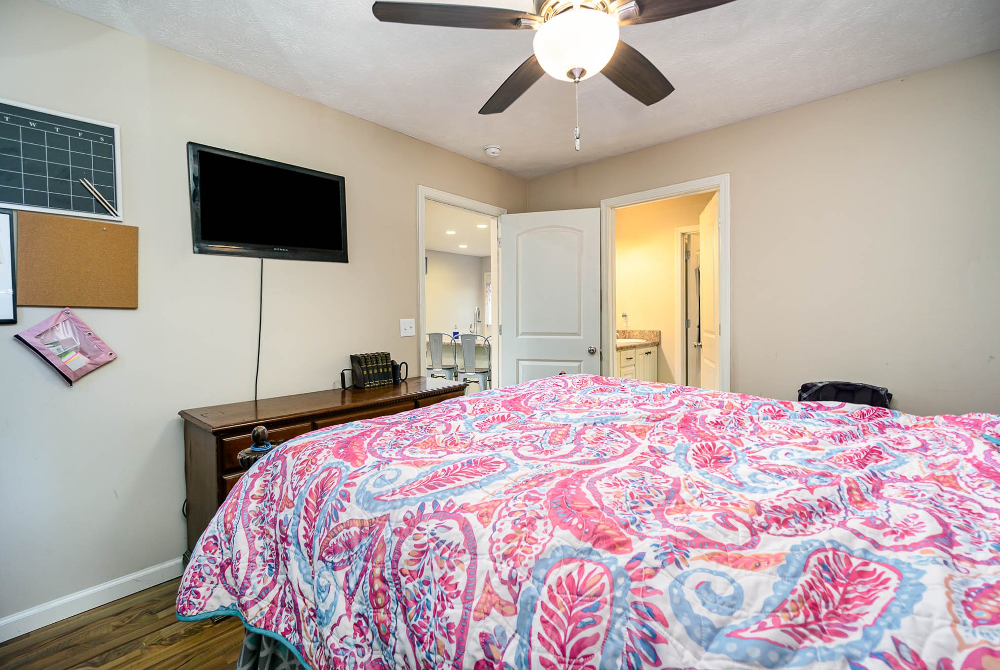 1679 Eno Road Dickson, TN 37055 - Photo 12 of 36 a bedroom with a bed and a flat screen tv