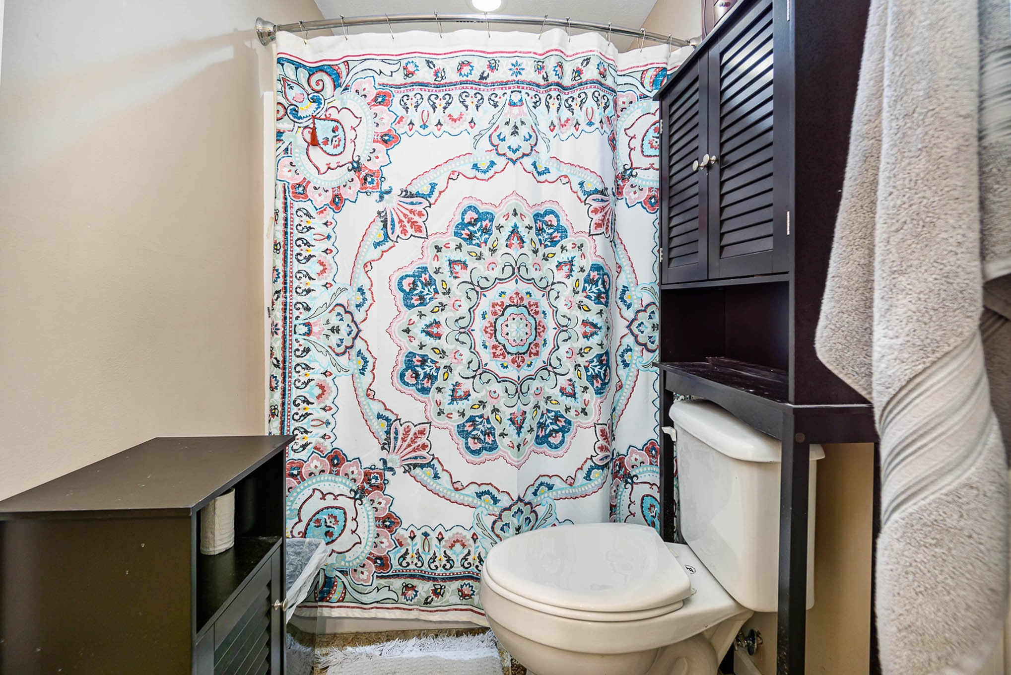 1679 Eno Road Dickson, TN 37055 - Photo 15 of 36 a white toilet sitting next to a shower curtain