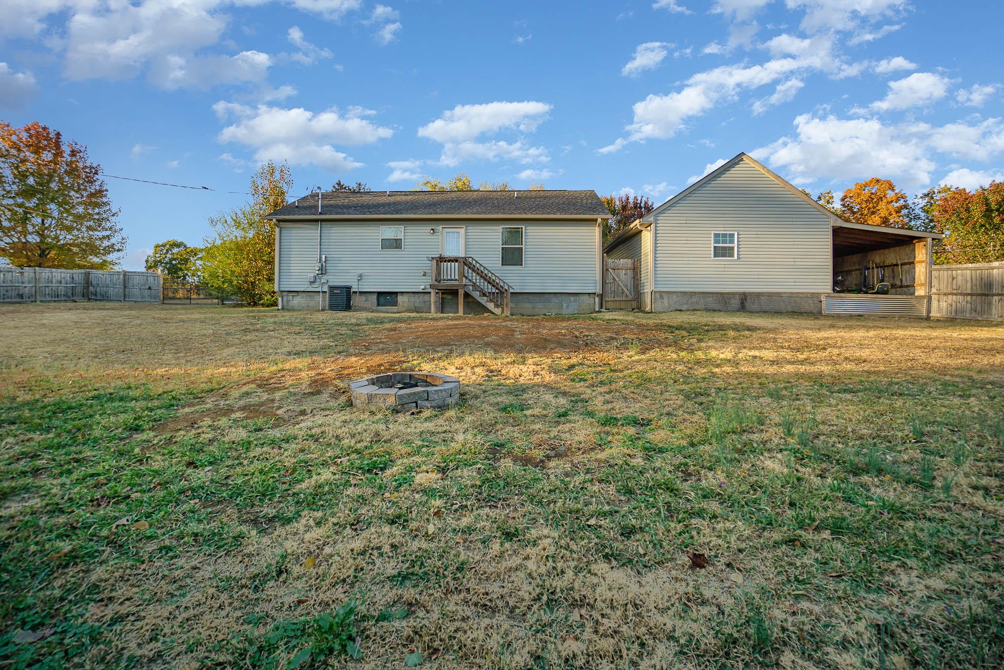 1679 Eno Road Dickson, TN 37055 - Photo 19 of 36 a view of a house with a backyard