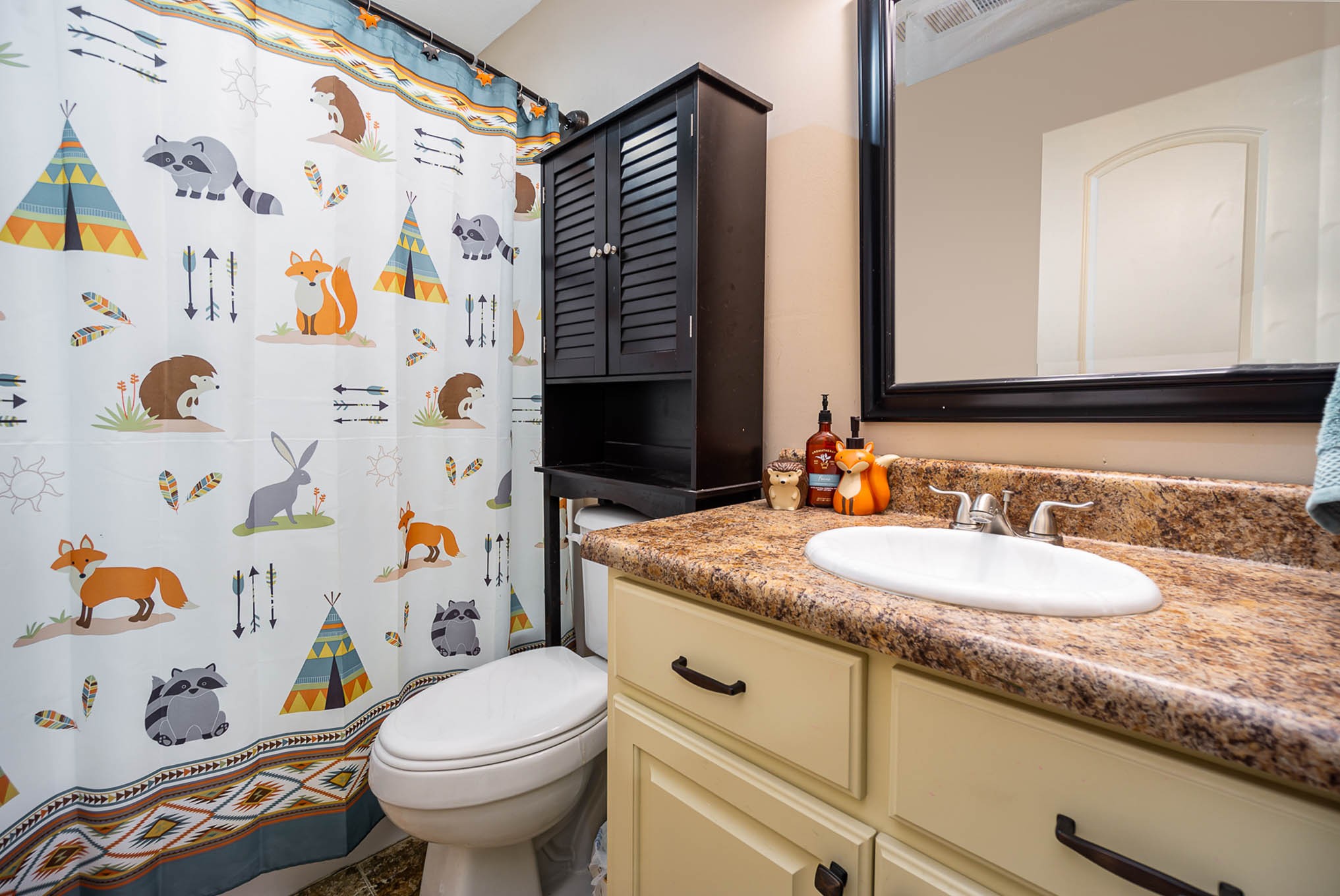 1679 Eno Road Dickson, TN 37055 - Photo 21 of 36 a bathroom with a granite countertop toilet sink and mirror