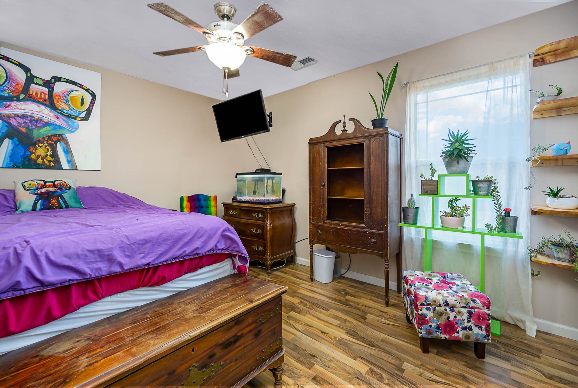 1679 Eno Road Dickson, TN 37055 - Photo 23 of 36 a bedroom with a bed cabinets and a book shelf