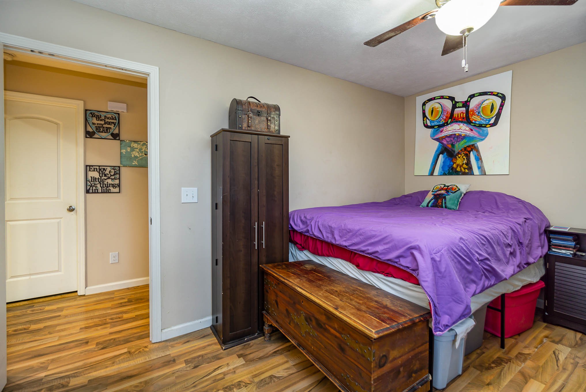 1679 Eno Road Dickson, TN 37055 - Photo 24 of 36 a bedroom with a bed and wooden floor