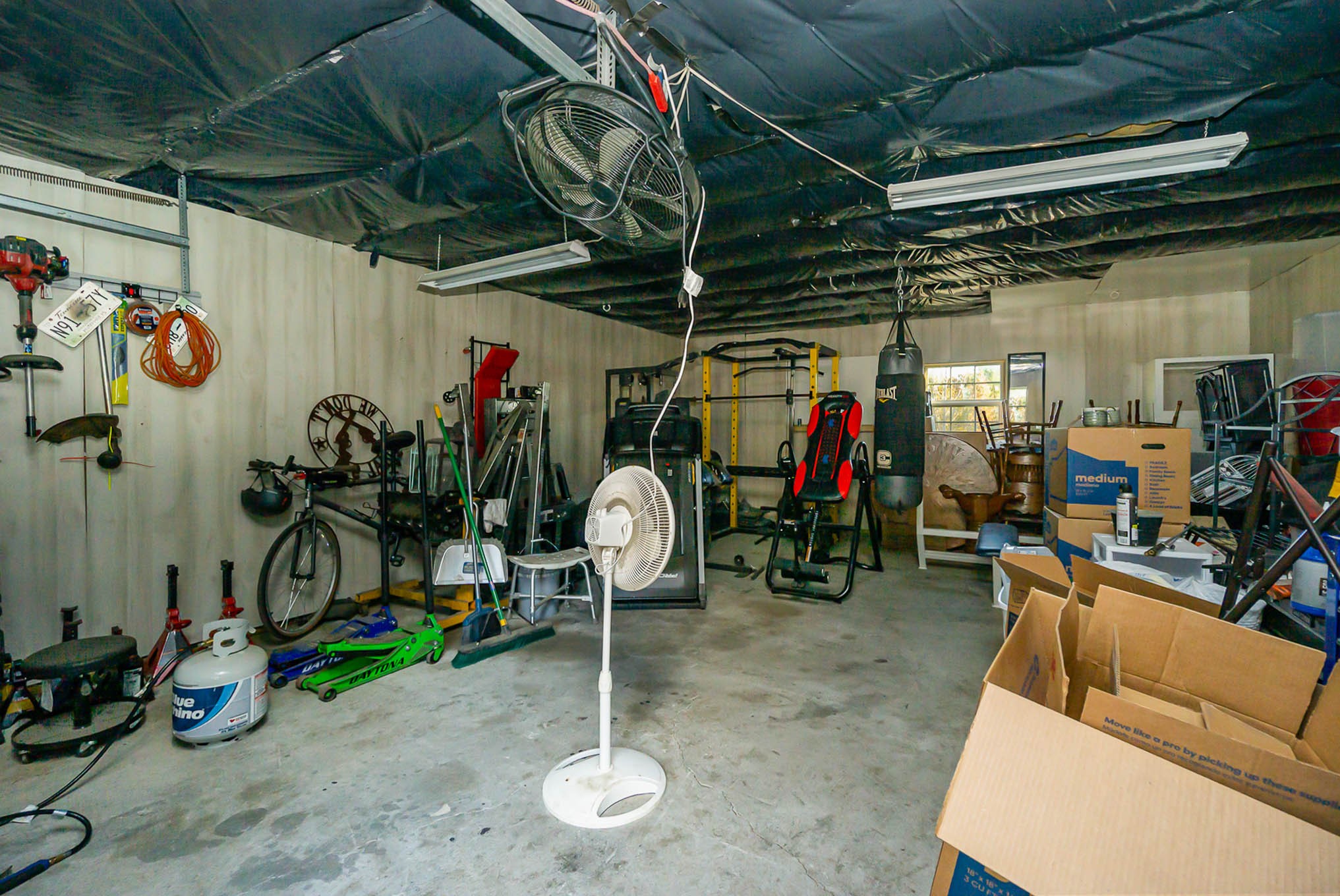 1679 Eno Road Dickson, TN 37055 - Photo 25 of 36 a view of a storage room with a lot of stuff