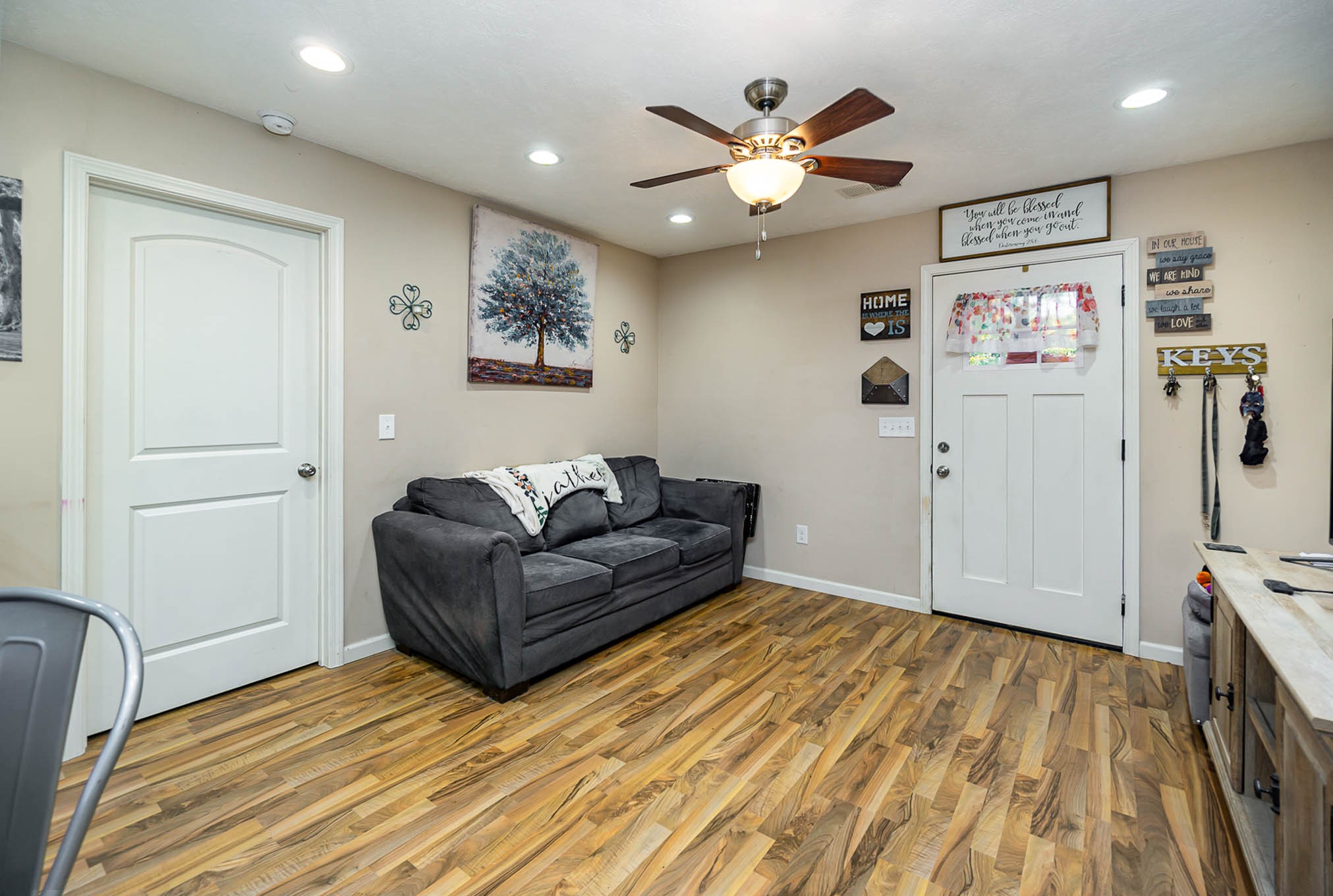 1679 Eno Road Dickson, TN 37055 - Photo 4 of 36 a living room with furniture and a wooden floor
