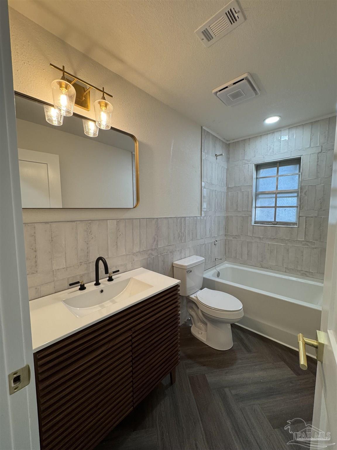 5520 Jones Street Milton, FL 32570 - Photo 16 of 16 a bathroom with a sink and a mirror