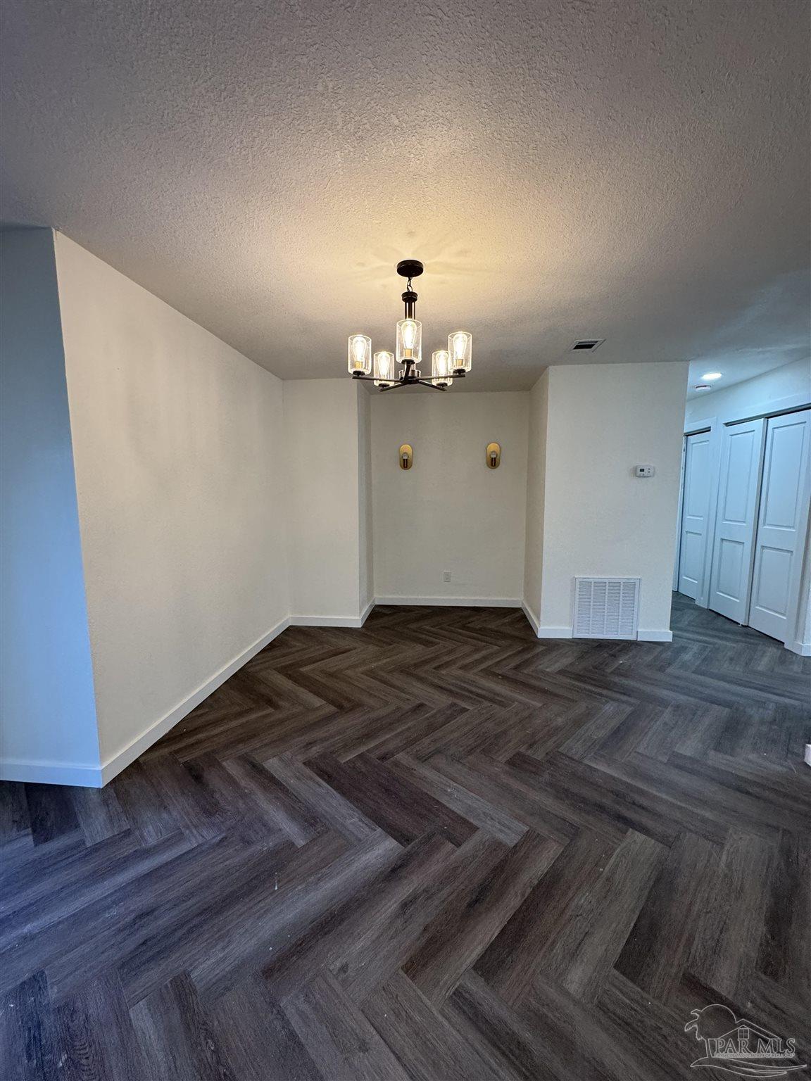 5520 Jones Street Milton, FL 32570 - Photo 5 of 16 a view of a room with wooden floor