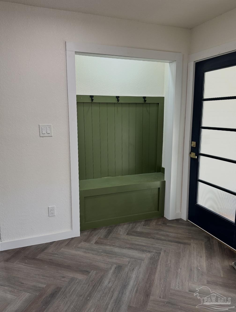 5520 Jones Street Milton, FL 32570 - Photo 6 of 16 a room with a window and a wooden door