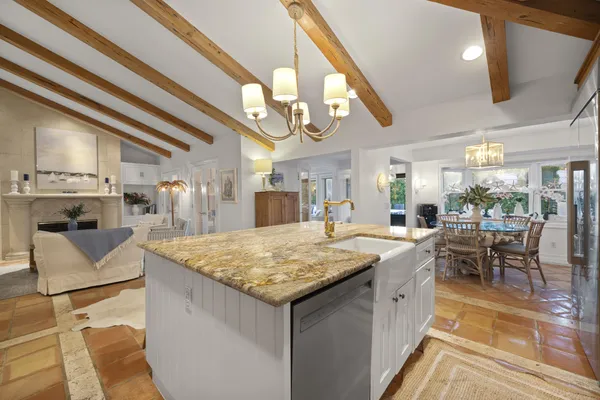 a living room with furniture and a table