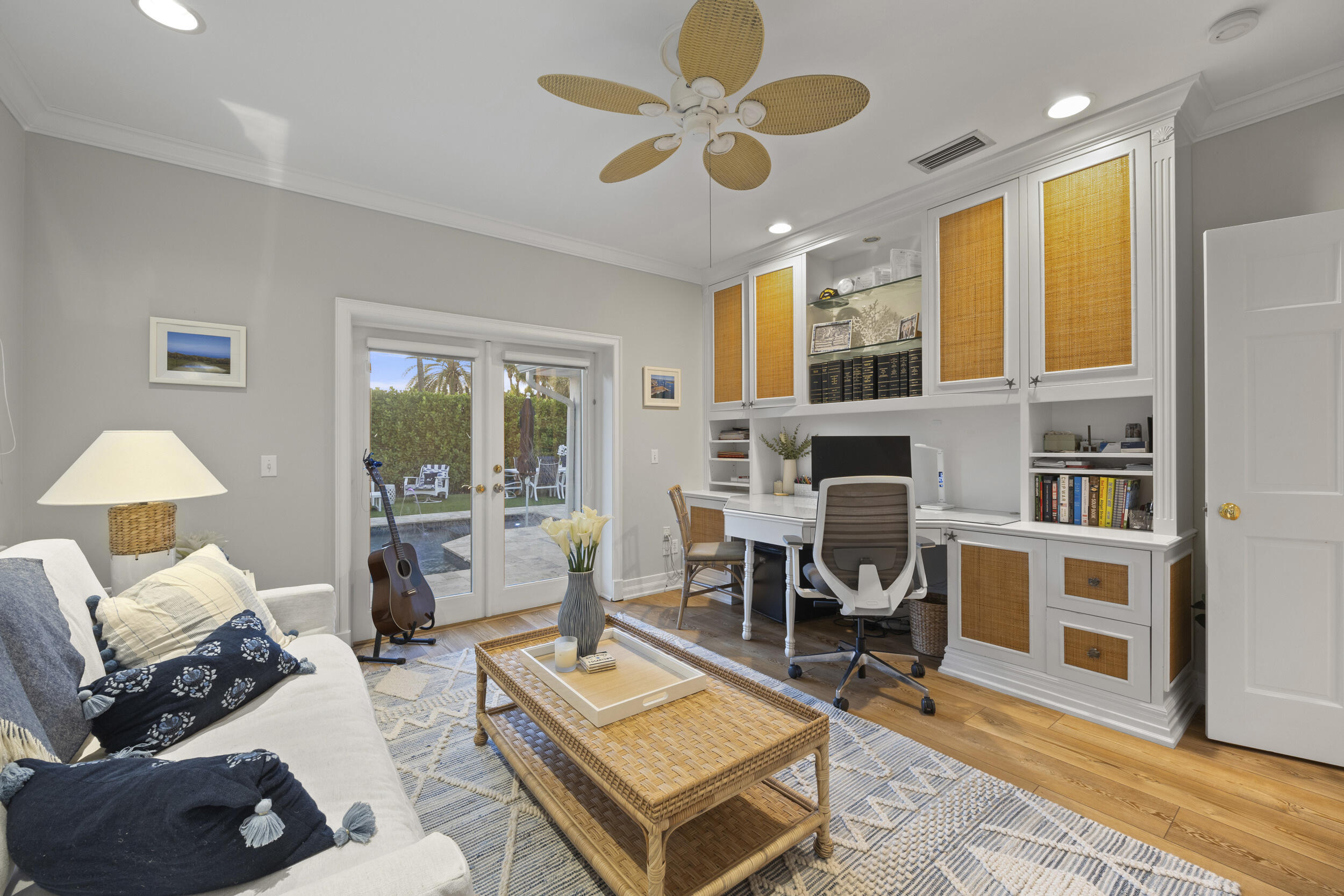 122 Lighthouse Drive Jupiter Inlet Colony, FL 33469 - Photo 29 of 84 a living room with furniture fireplace and a large window