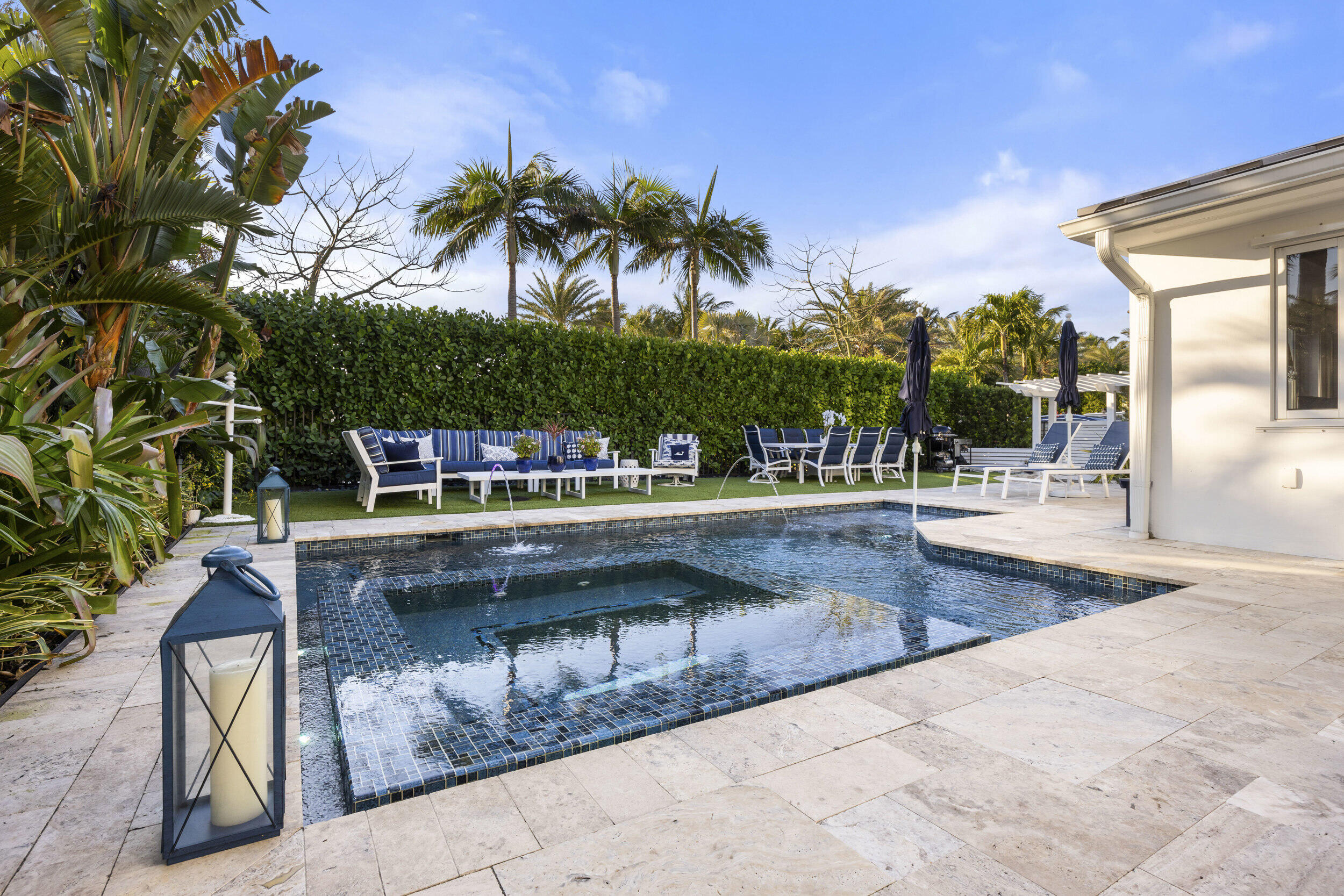 122 Lighthouse Drive Jupiter Inlet Colony, FL 33469 - Photo 62 of 84 a view of swimming pool with outdoor seating