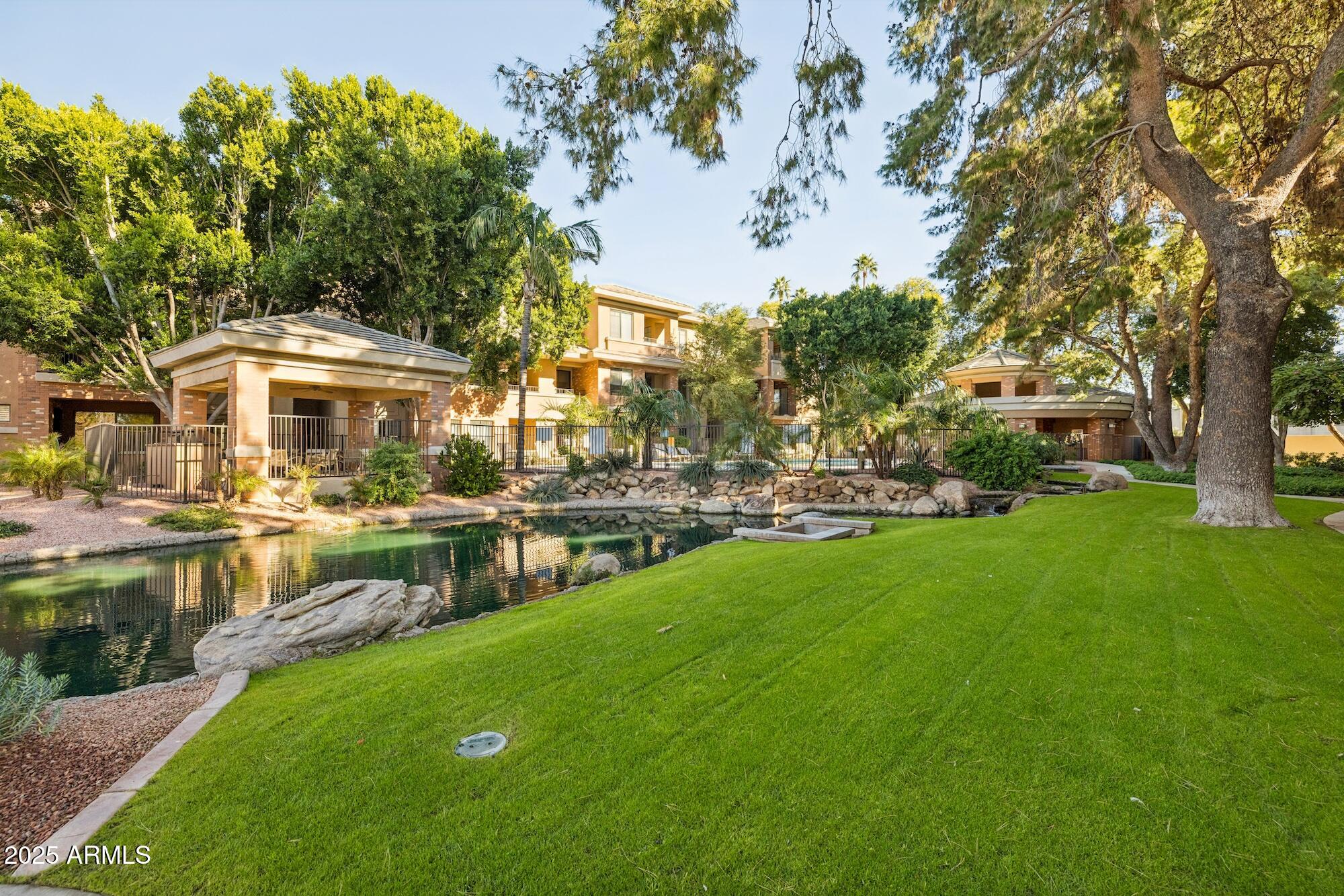2989 North 44th Street, Unit 2023 Phoenix, AZ 85018 - Photo 1 of 20 a view of a house with a yard
