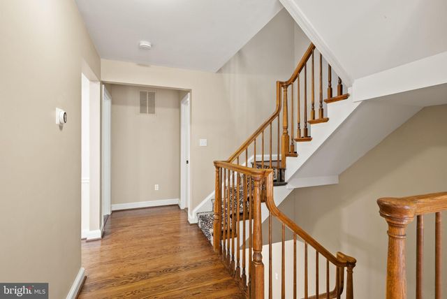 a view of a dining room with furniture and window