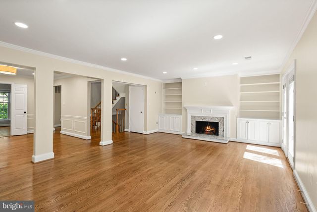 a kitchen with stainless steel appliances granite countertop a stove and a refrigerator