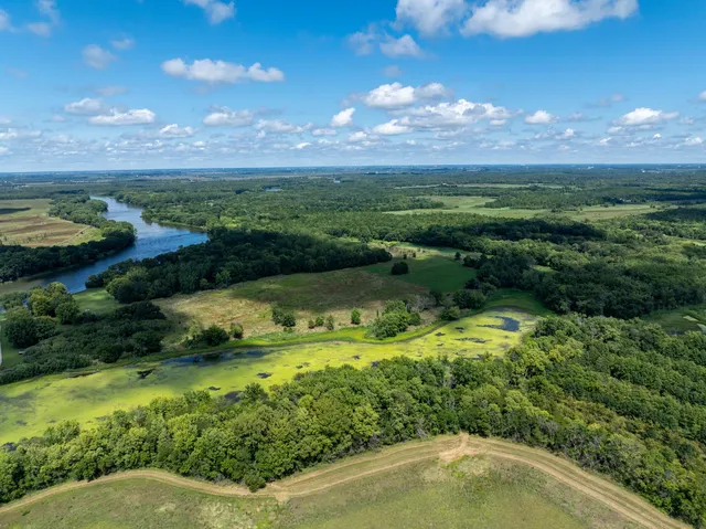 a view of a lake from a yard