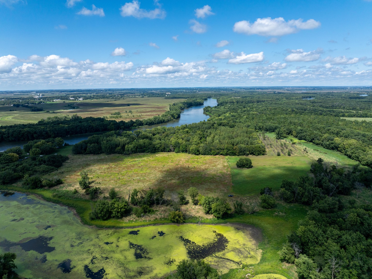 0 Banks Road Erie, IL 61250 - Photo 14 of 71 a view of a lake with a yard in the background